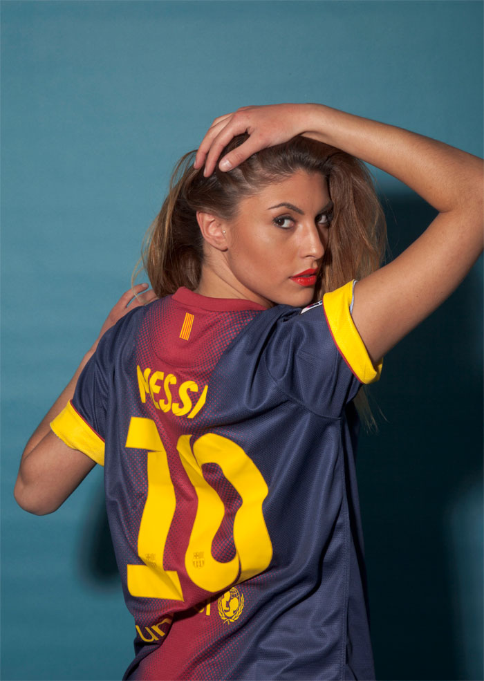 The FC Barcelona girl showing the name and numbers to the world